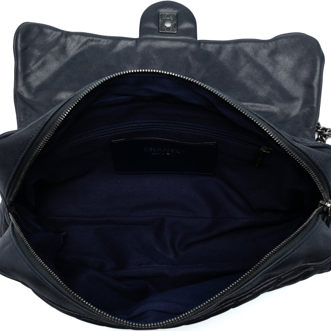 Chanel Large Quilted Iridescent Cuir de veau Shiva Flap Noir – GABY PARIS Authentique