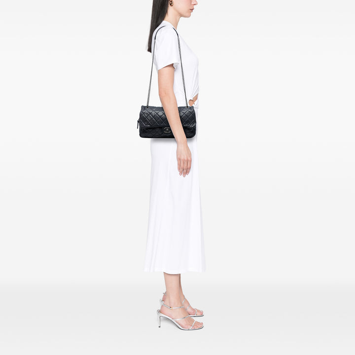 Chanel Large Quilted Iridescent Cuir de veau Shiva Flap Noir – GABY PARIS Authentique