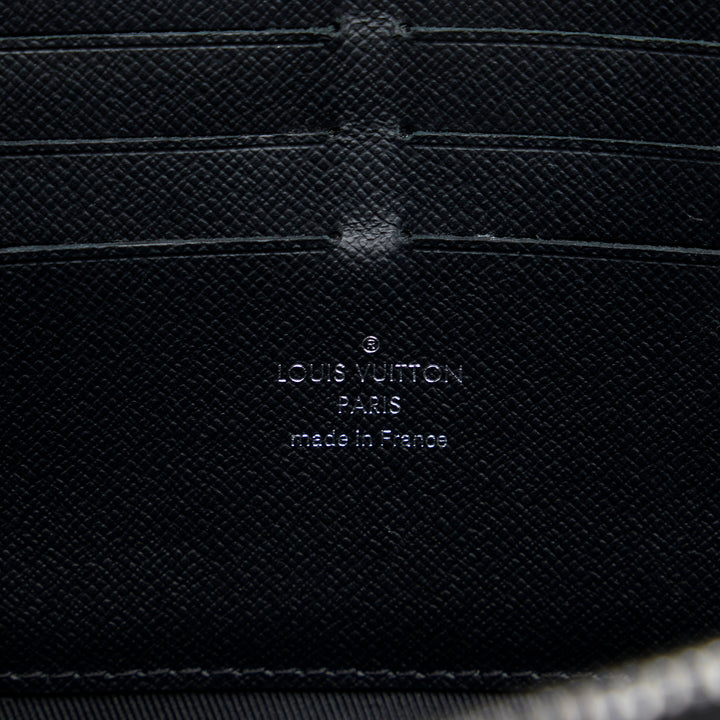 Louis Vuitton Monogram Eclipse Soft Trunk Wallet Sac porté croisé Noir