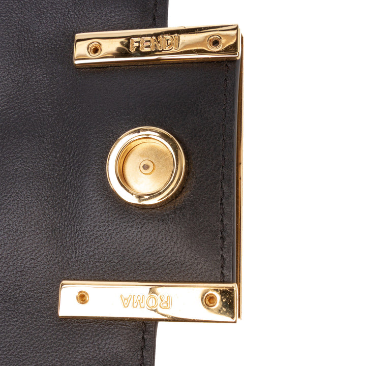 Fendi Zucca Embossed Cuir Baguette Phone Pochette Sac cartable Noir – GABY PARIS Authentique