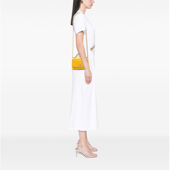 Chanel Small Quilted Cuir d’agneau Chain Infinity Top Handle Bag Jaune – GABY PARIS Authentique