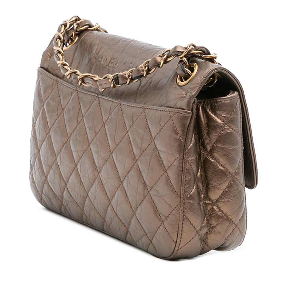 Chanel Paris Dallas Métallisé Cuir de veau Embossed Logo Flap Marron – GABY PARIS Authentique