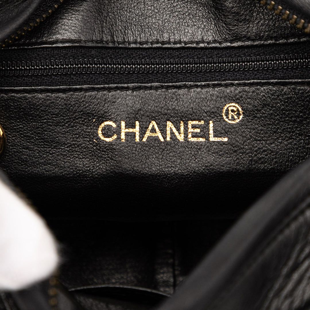 Chanel CC Quilted Cuir d’agneau Tassel Sac caméra Noir – GABY PARIS Authentique