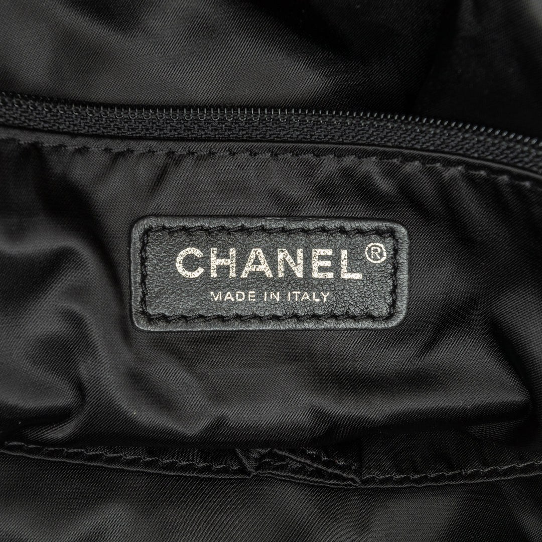 Chanel Large Quilted Knit Pluto Glitter Satchel Noir – GABY PARIS Authentique