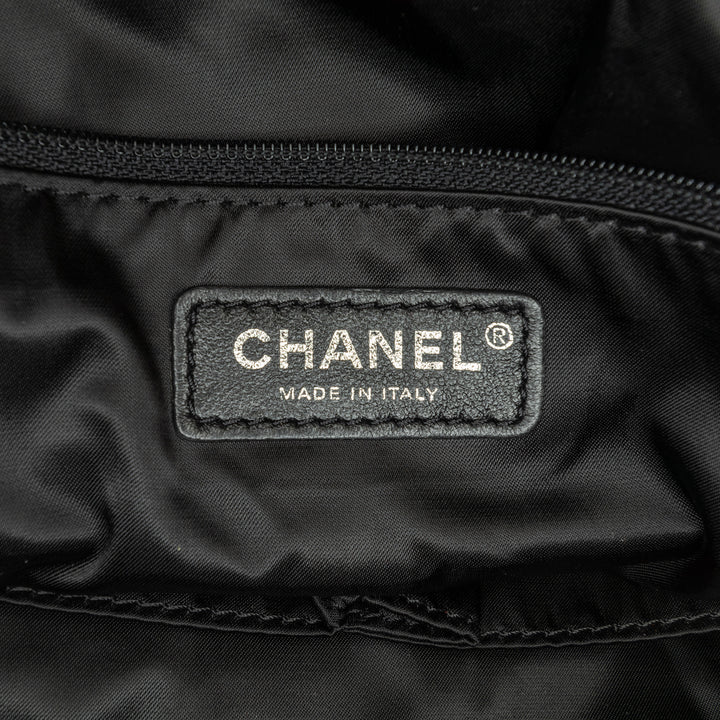 Chanel Large Quilted Knit Pluto Glitter Satchel Noir – GABY PARIS Authentique