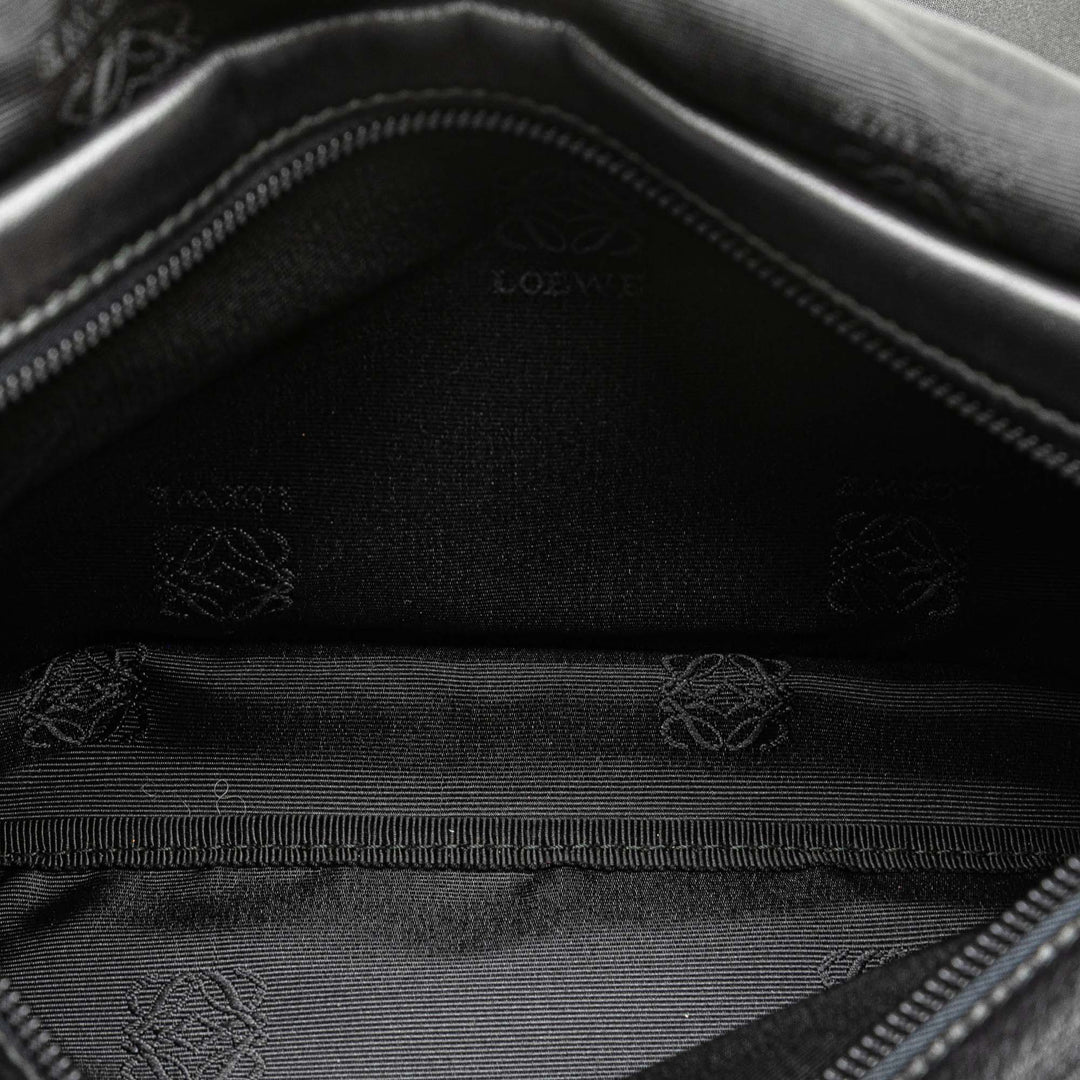 Anagram Leather Clutch Black - Gaby Paris