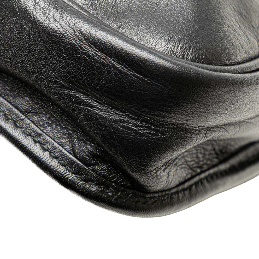 Anagram Leather Clutch Black - Gaby Paris