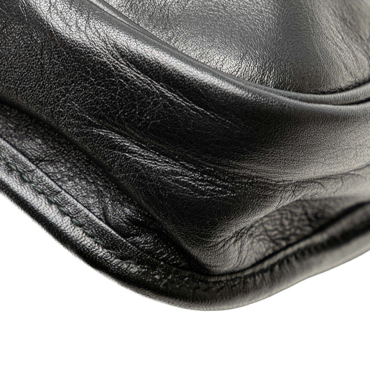 Anagram Leather Clutch Black - Gaby Paris