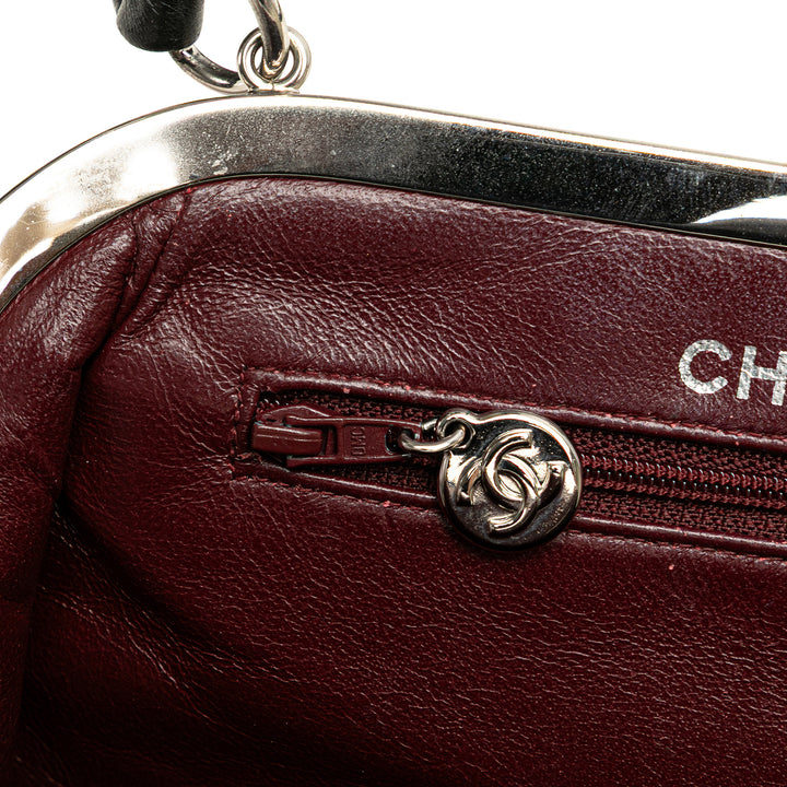 CC Quilted Lambskin Kiss Lock Frame Top Handle Bag Black - Gaby Paris