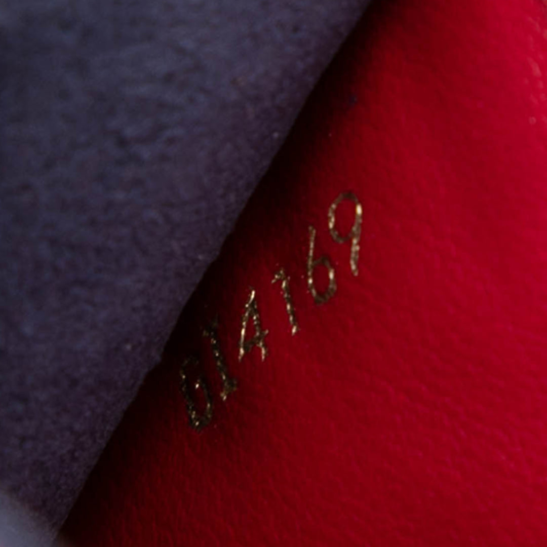 Louis Vuitton Double Zippé Pochette Cuir Monogram Empreinte