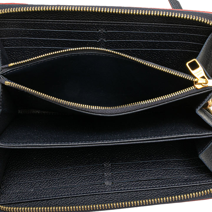 Monogram Empreinte Zippy Long Wallet Blue - Gaby Paris