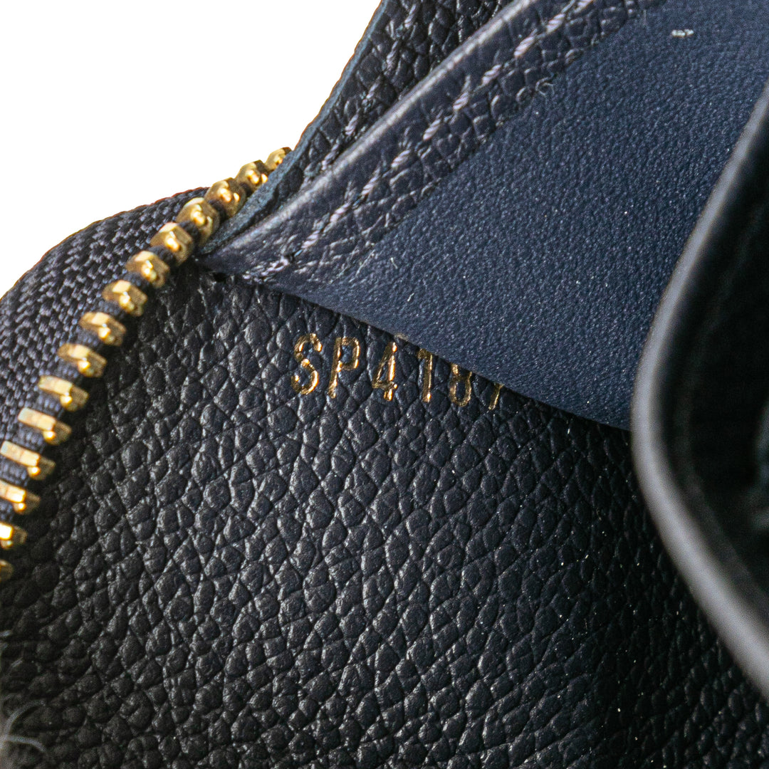 Monogram Empreinte Zippy Long Wallet Blue - Gaby Paris