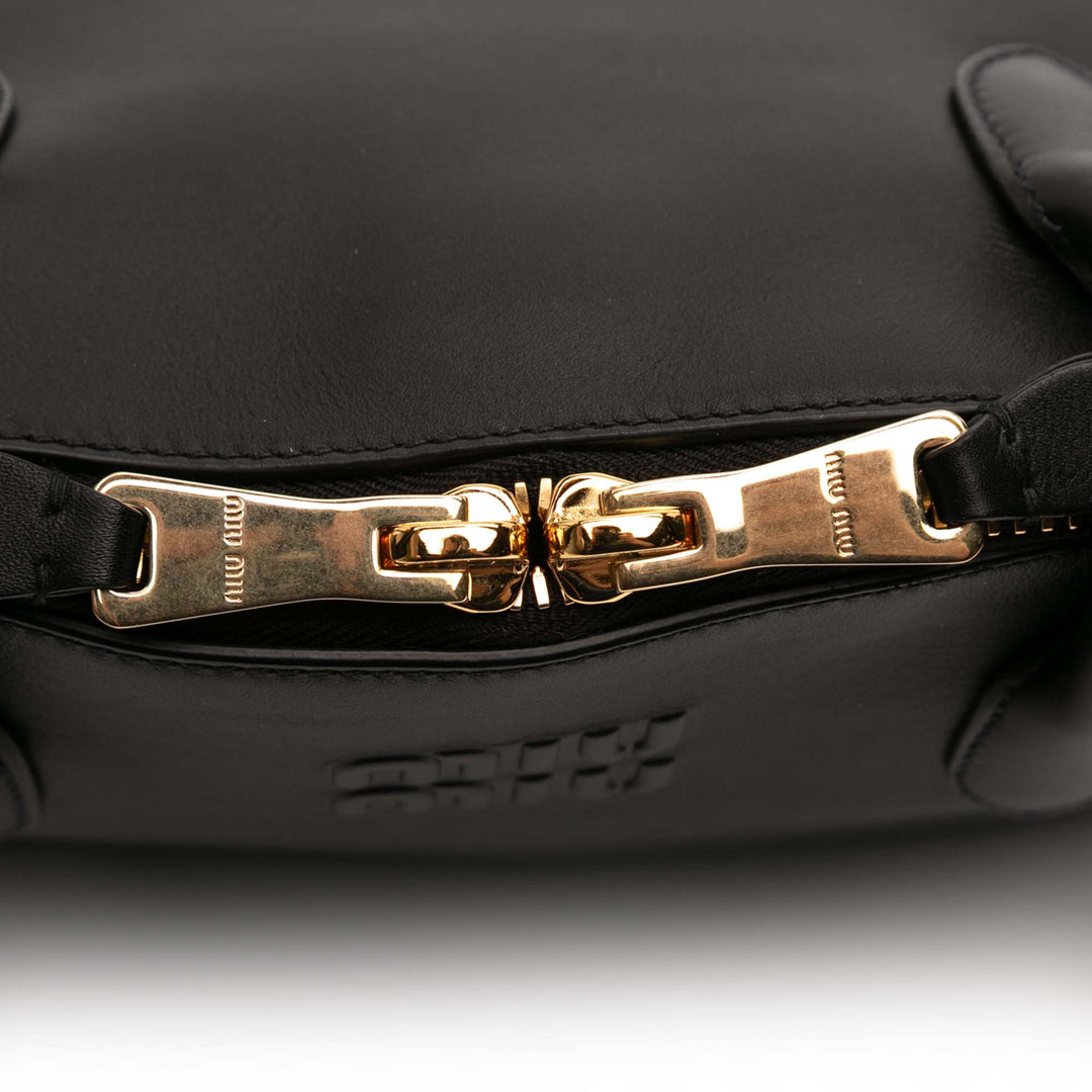 Miu Miu Soupley embossé Logo Sac Cuir de veau