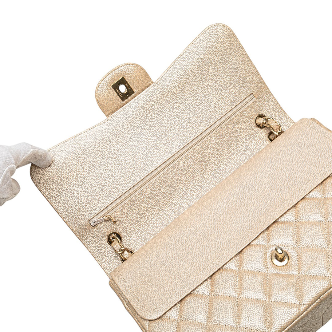 Jumbo Classic Iridescent Caviar Double Flap Gold - Gaby Paris
