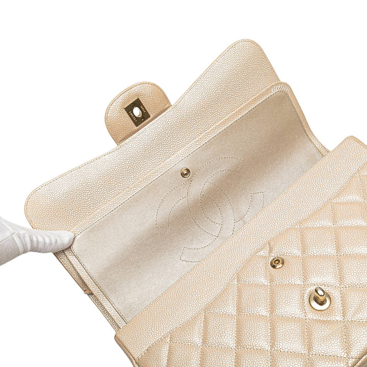 Jumbo Classic Iridescent Caviar Double Flap Gold - Gaby Paris
