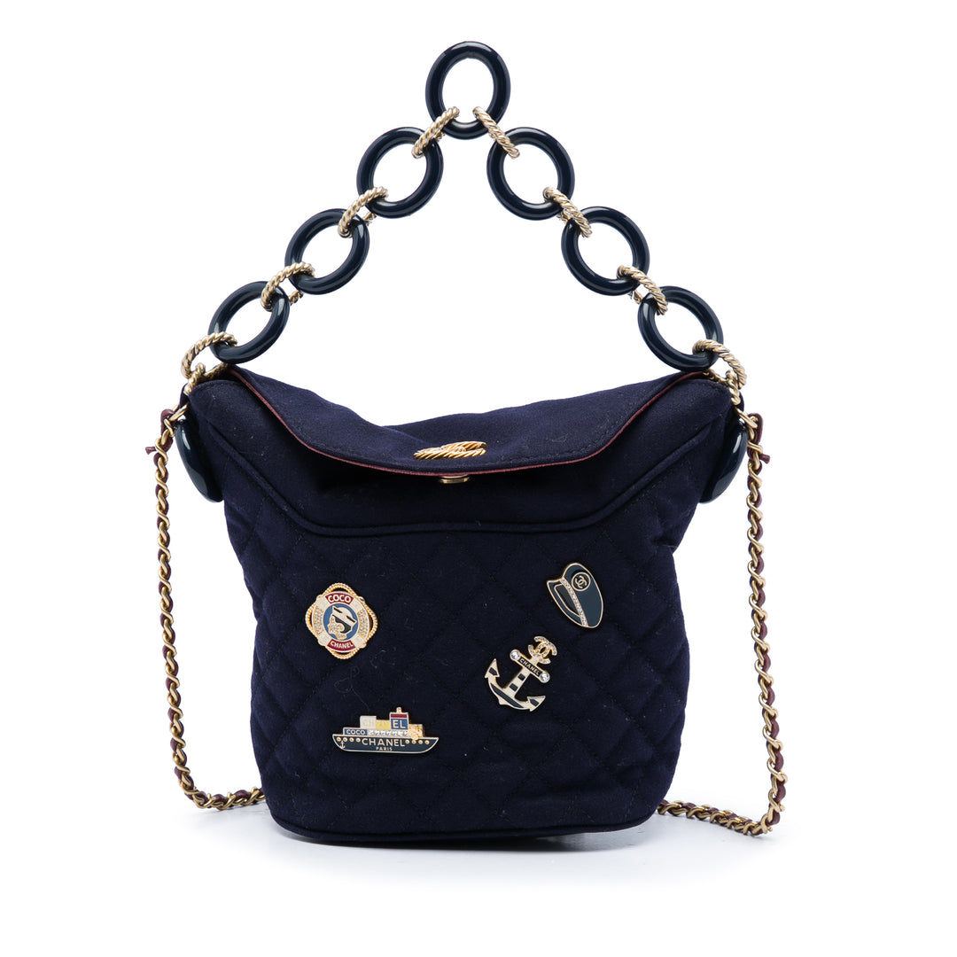 Chanel Paris Hamburg Matelassé Coco Sailor Charms Sac seau Bleu – vue principale – GABY PARIS