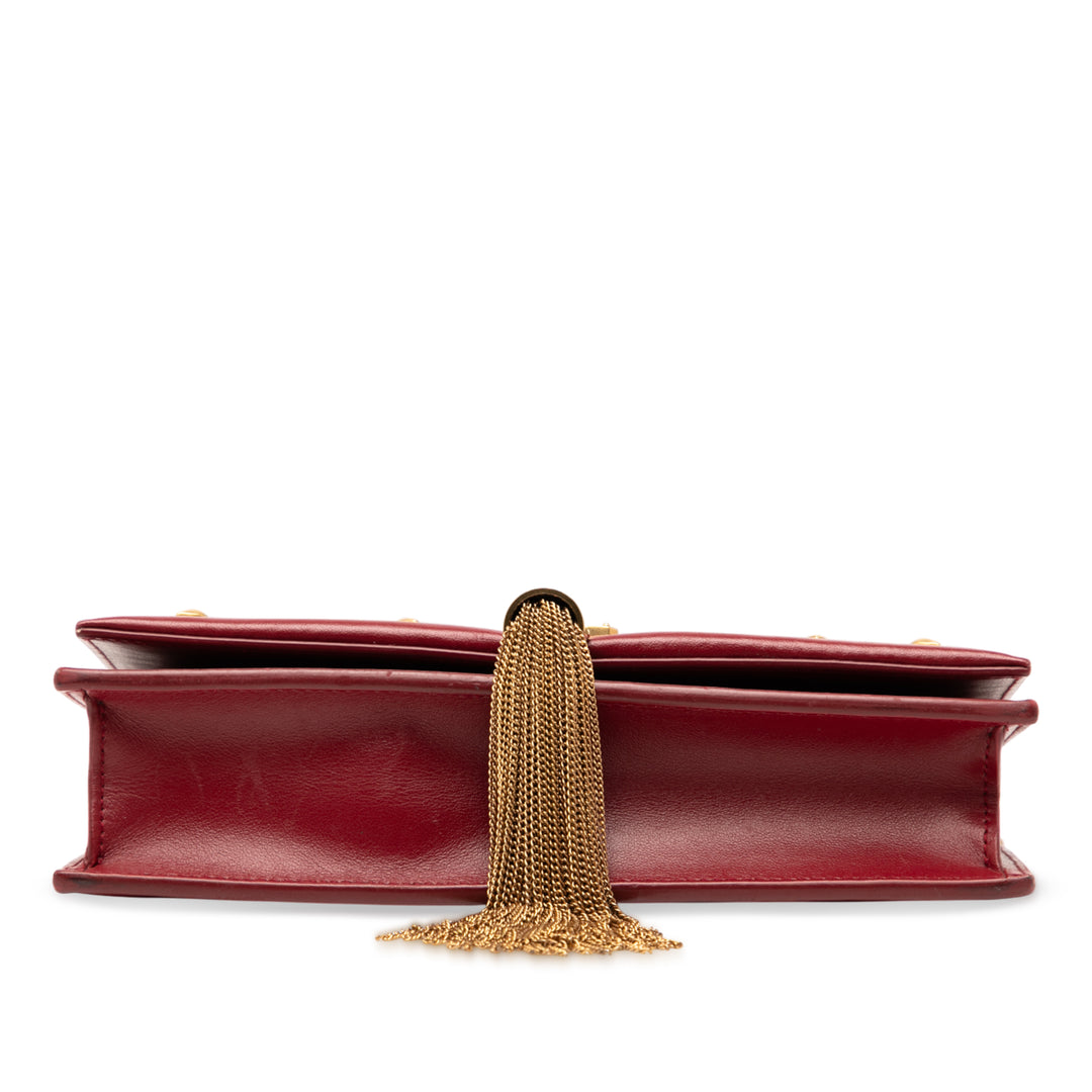 Saint Laurent Cuir de veau Heart Studded Classic Monogram Kate Tassel Wallet on Chain Rouge – GABY PARIS Authentique