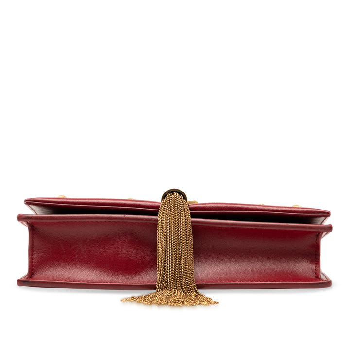Saint Laurent Cuir de veau Heart Studded Classic Monogram Kate Tassel Wallet on Chain Rouge – GABY PARIS Authentique