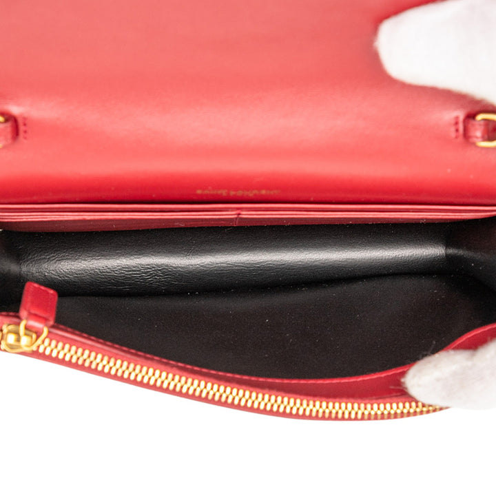 Saint Laurent Cuir de veau Heart Studded Classic Monogram Kate Tassel Wallet on Chain Rouge – GABY PARIS Authentique