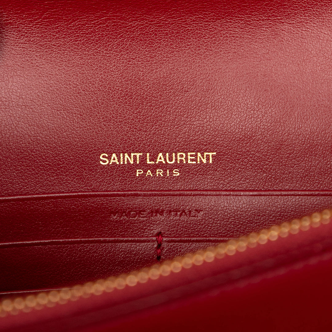 Saint Laurent Cuir de veau Heart Studded Classic Monogram Kate Tassel Wallet on Chain Rouge – GABY PARIS Authentique