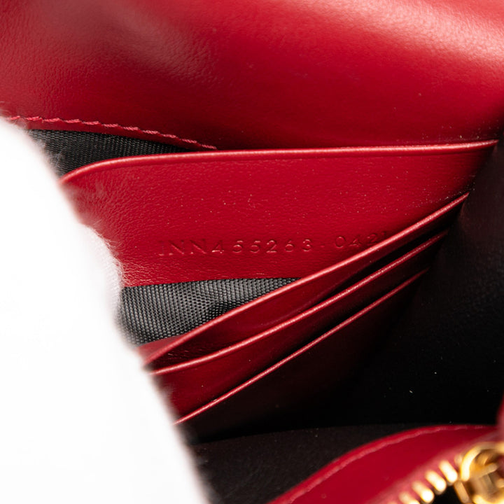 Saint Laurent Cuir de veau Heart Studded Classic Monogram Kate Tassel Wallet on Chain Rouge – GABY PARIS Authentique