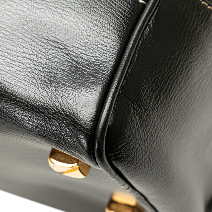 Leather Velazquez Twist Duffle Bag Brown - Gaby Paris