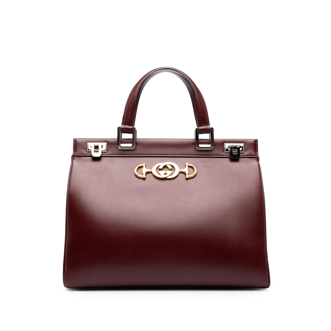 Gucci Sac à main Zumi à Moyen Cuir de veau Rouge – vue principale – GABY PARIS