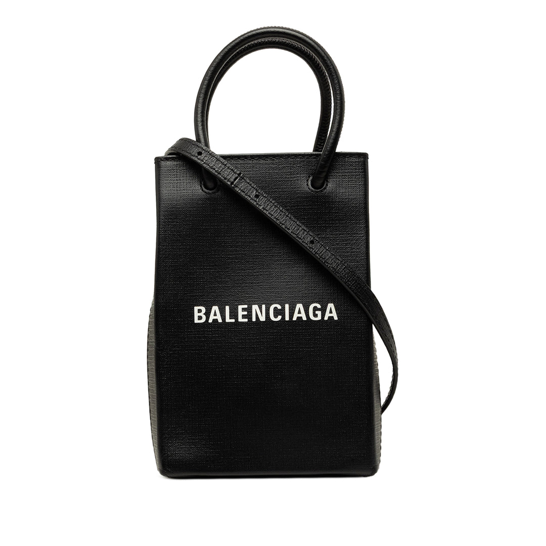 Balenciaga Étui téléphone Logo Cabas Mini Cuir de veau Noir – vue principale – GABY PARIS