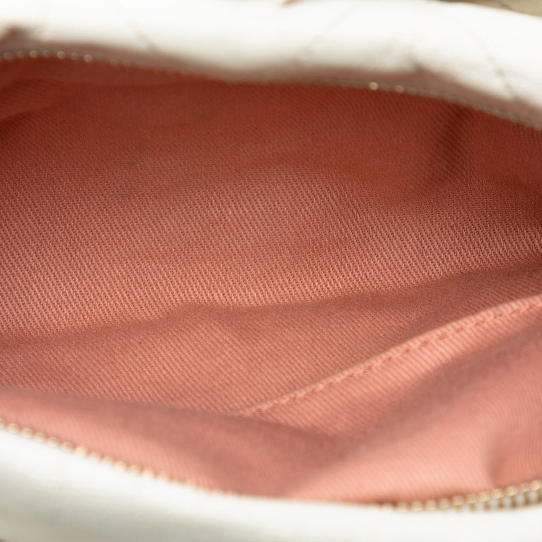 Chanel Quilted Cuir de veau Midnight Swim Baluchon Bag Blanc – GABY PARIS Authentique