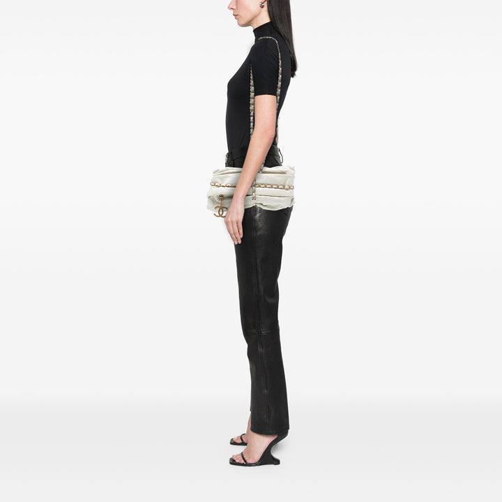 Chanel Quilted Cuir de veau Midnight Swim Baluchon Bag Blanc – GABY PARIS Authentique