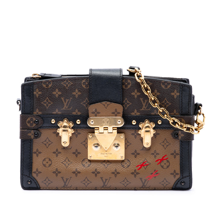 Louis Vuitton Trunk Pochette Monogram Reverse Marron – vue principale – GABY PARIS