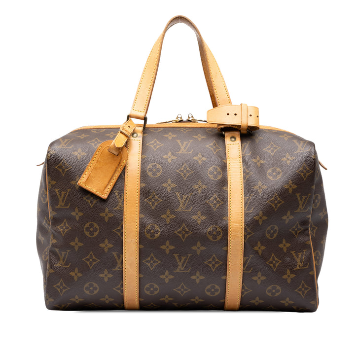 Louis Vuitton Sac de voyage Souple 35 Monogram Marron – vue principale – GABY PARIS
