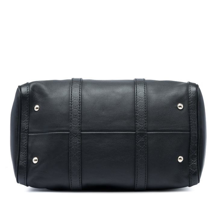 Guccissima à finitions Joy Boston Sac Moyen Cuir de veau Noir