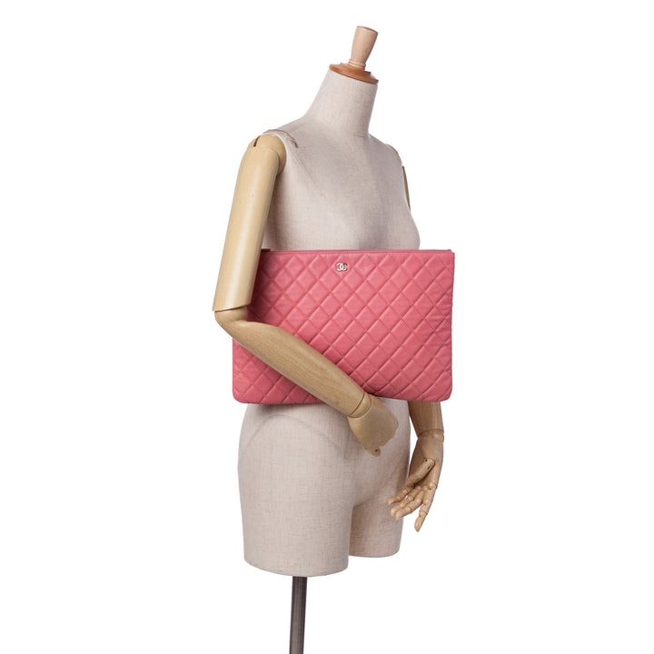 Large Quilted Caviar O Case Clutch Pink - Gaby Paris