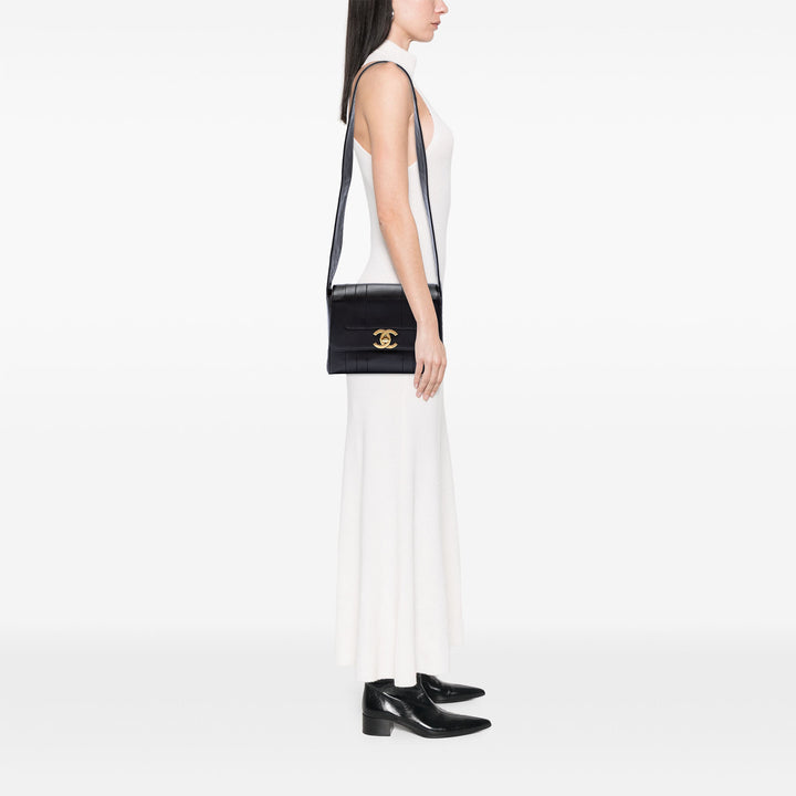 Chanel CC Vertical Quilt Cuir d’agneau à rabat