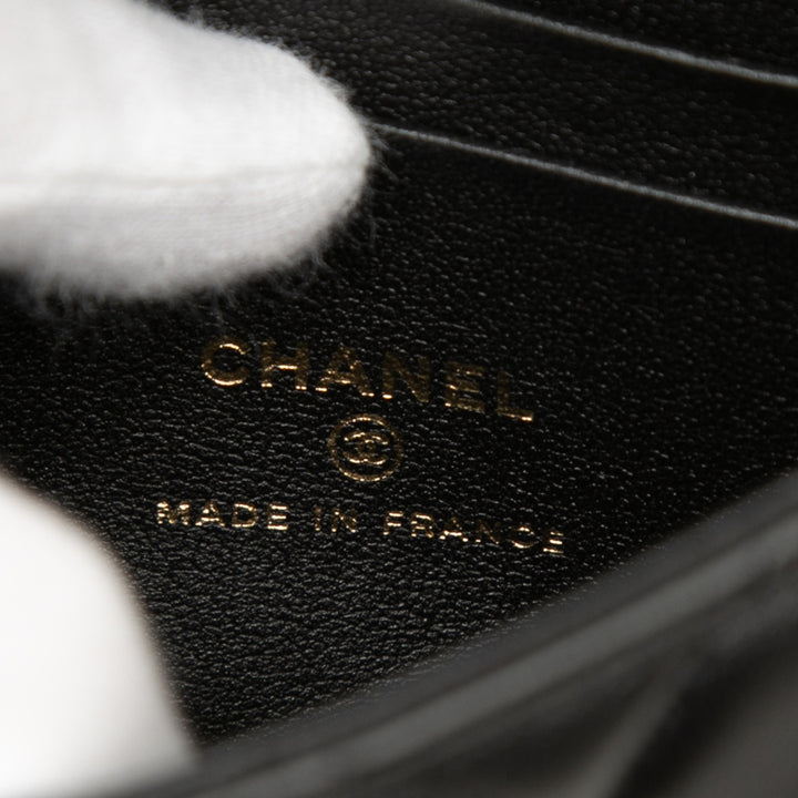 Chanel CC Matelassé à rabat Pochette avec chaîne Cuir d'agneau Noir