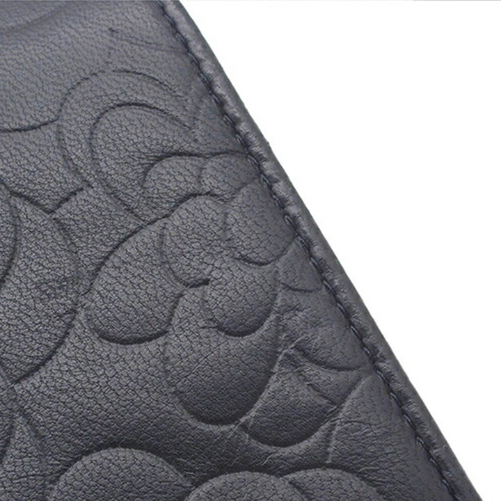CC embossé Camellia Wallet on Chain Cuir d'agneau Noir