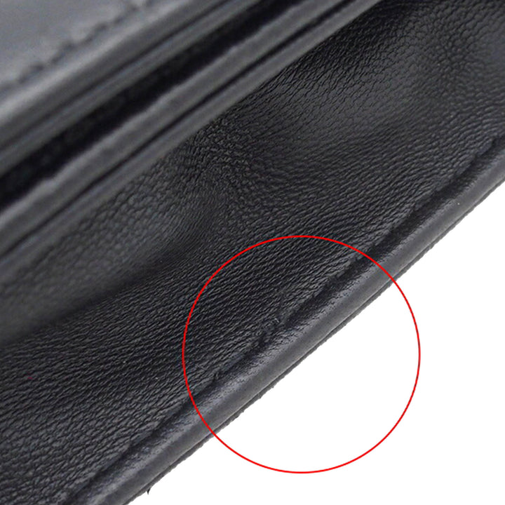 CC embossé Camellia Wallet on Chain Cuir d'agneau Noir