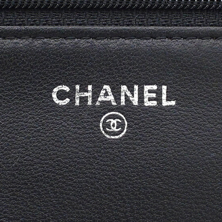 CC embossé Camellia Wallet on Chain Cuir d'agneau Noir