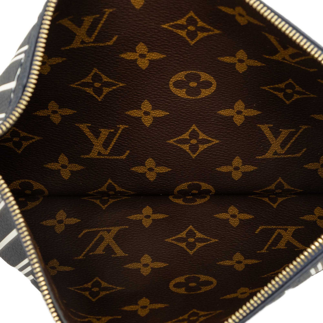Louis Vuitton Pochette Neverfull Inside Out MM Cuir de veau Bleu – vue 4 – GABY PARIS