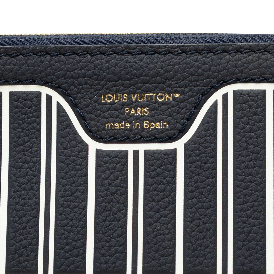 Louis Vuitton Pochette Neverfull Inside Out MM Cuir de veau Bleu – vue 5 – GABY PARIS
