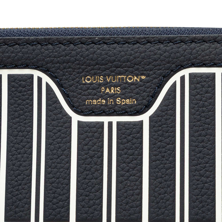 Louis Vuitton Pochette Neverfull Inside Out MM Cuir de veau Bleu – vue 5 – GABY PARIS