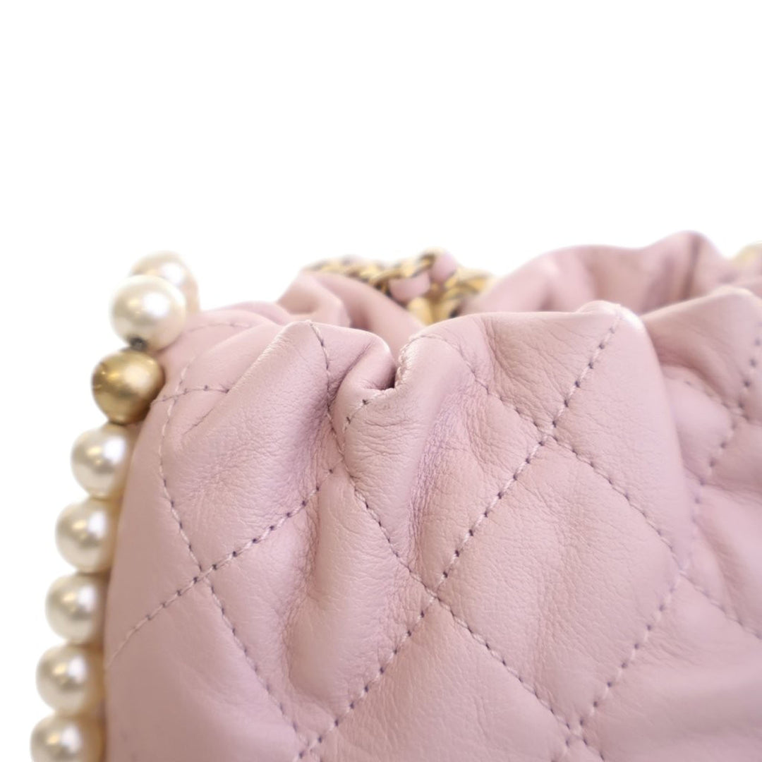 Chanel Mini Matelassé Cuir de veau About Perles Drawstring Bucket Sac