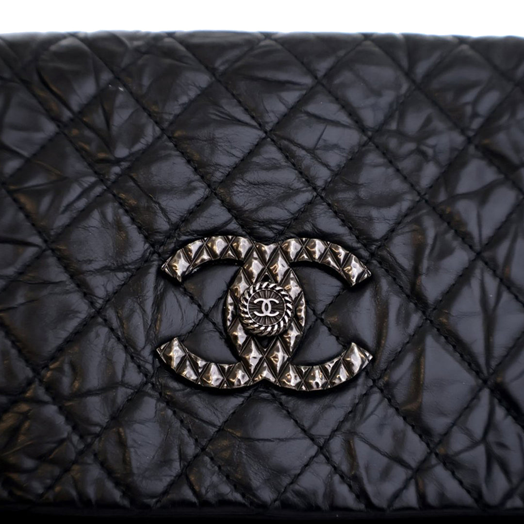 Chanel Matelassé vieilli Cuir de veau CC Foldover à rabat