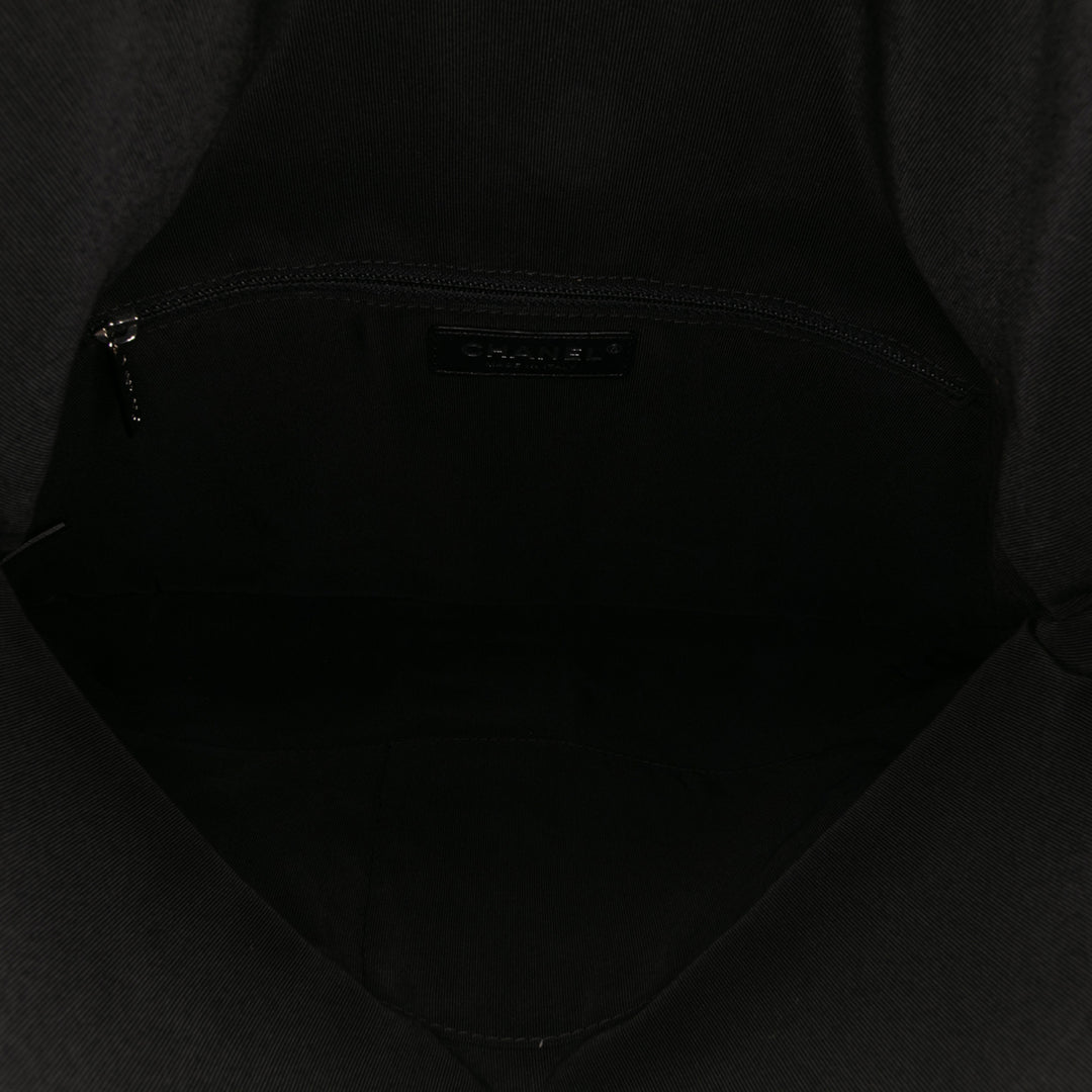 Chanel CC Matelassé Cuir d’agneau Grip Pochette