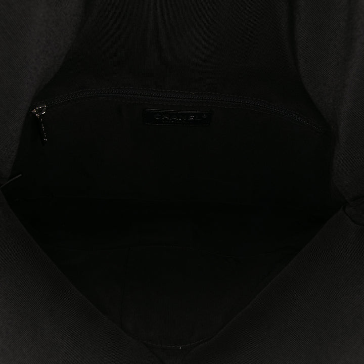 Chanel CC Matelassé Cuir d’agneau Grip Pochette