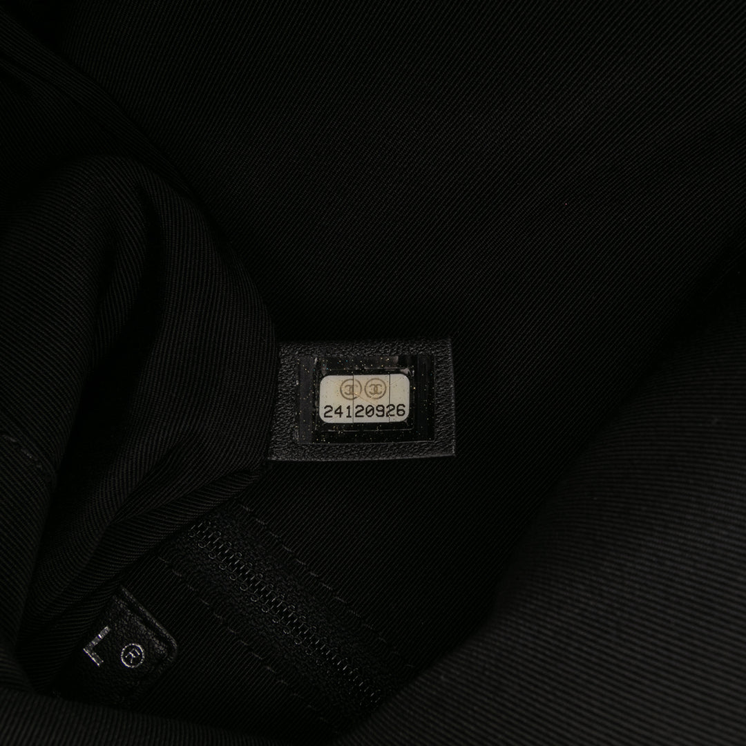 Chanel CC Matelassé Cuir d’agneau Grip Pochette