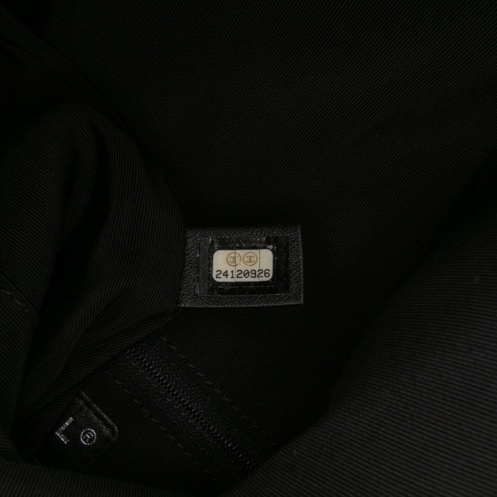 Chanel CC Matelassé Cuir d’agneau Grip Pochette