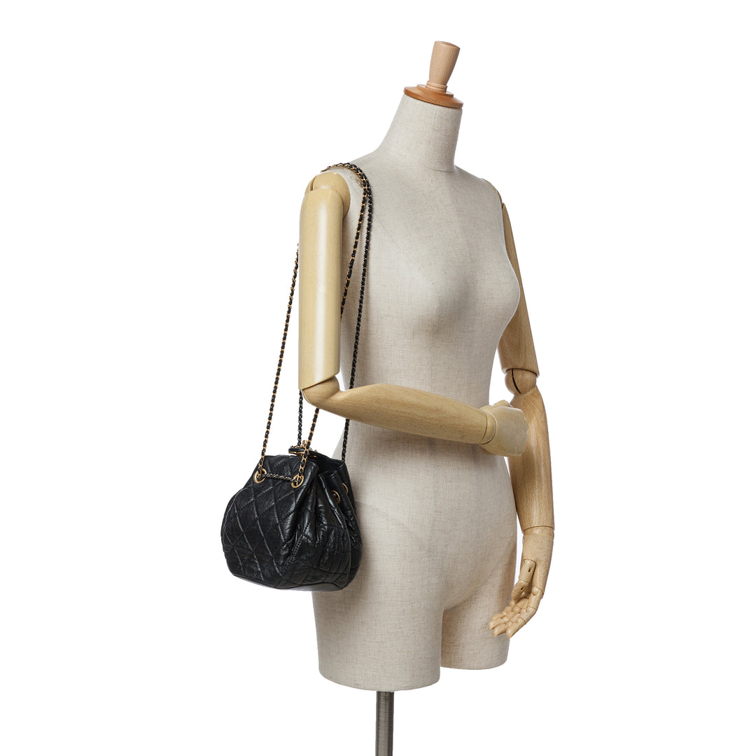 CC Quilted Lambskin Chain Drawstring Bucket Bag Black - Gaby Paris