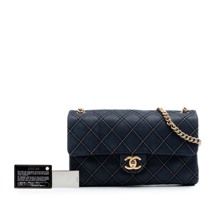 Chanel Jumbo Matelassé Cuir de veau Triple Surpiqué à rabat